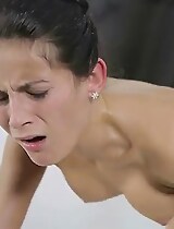 Oily brunette fucked doggy style